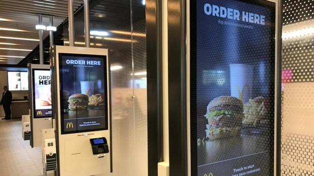 McDonald’s self-service kiosks are seen in a prototype restaurant housed in a warehouse in Chicago’s West Loop area, in Chicago (Reuters photo) McDonald’s self-service kiosks are seen in a prototype restaurant housed in a warehouse in Chicago’s West Loop area, in Chicago (Reuters photo)