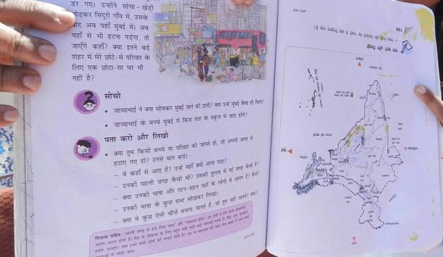 A student shows a class 5 book called ‘Hamari Duniya’ in which the map of India has been published upside down. Books provided by Delhi government in this academic session have several printing errors.