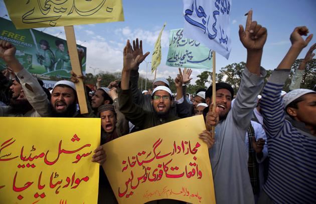 Students of Islamic seminaries chant slogans during a rally in support of blasphemy laws in Islamabad. (AP File) Students of Islamic seminaries chant slogans during a rally in support of blasphemy laws in Islamabad. (AP File)