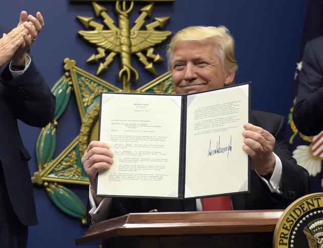 President Donald Trump’s revised travel ban is “substantially different” from the original and a judge shouldn’t apply a previous restraining order to the new version, federal lawyers said in a court filing.(AP File Photo)