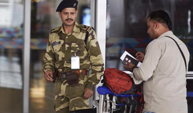CISF personnel at the entry gate at IGI Airport. Passengers are rarely frisked at the terminal entry gates. The personnel check tickets and ID proof only.(Ravi Choudhary/HT Photo)