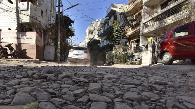 Residents of Sushant Lok said their society roads have not been repaired in seven years. (Sanjeev Verma/HT PHOTO) Residents of Sushant Lok said their society roads have not been repaired in seven years. (Sanjeev Verma/HT PHOTO)