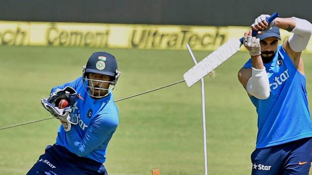 India cricket team captain Virat Kohli and wicketkeeper Wriddhiman Saha during a practice session before the third Test against Australia cricket team in Ranchi on Wednesday.(PTI)