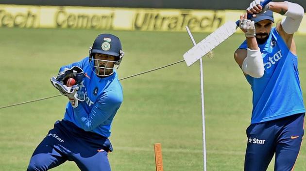 India cricket team captain Virat Kohli and wicketkeeper Wriddhiman Saha during practice session ahead of the third Test against Australia cricket team in Ranchi on Wednesdsay. (PTI) India cricket team captain Virat Kohli and wicketkeeper Wriddhiman Saha during practice session ahead of the third Test against Australia cricket team in Ranchi on Wednesdsay. (PTI)