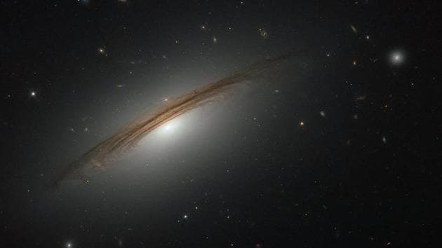 This NASA/ESA Hubble Space Telescope image captures the galaxy UGC 12591. A Swiss-Israeli company is carrying out scientific experiments in space in a laboratory shrunk to the size of a tissue box in a tiny satellite. (ESA/Hubble and NASA)