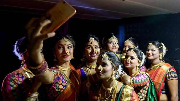 Lavani dancers take a selfie after the show. (Kunal Patil/HT Photo) 