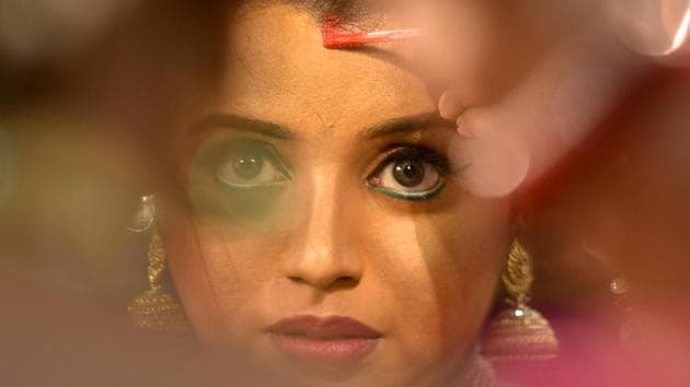 Akanksha Kadam, a dancer, gets ready backstage. (Kunal Patil/HT Photo) 
