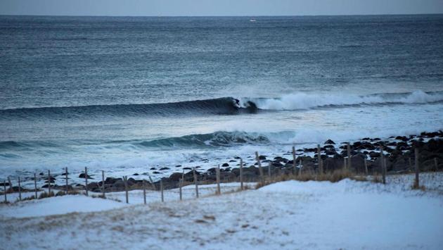 A surfer rides a wave at Unstad along the northern Atlantic Ocean. (Olivier Morin/AFP) A surfer rides a wave at Unstad along the northern Atlantic Ocean. (Olivier Morin/AFP)