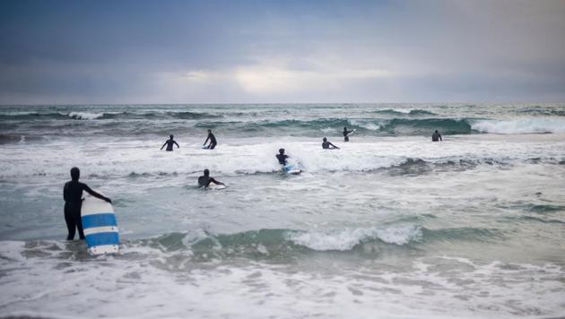 Novice surfers learn how to ride a wave in Unstad along the northern Atlantic Ocean, where the water temperatures is at five degrees centigrade and the air temperature is at minus two degrees centigrade. Unstad, the world's most northern surf school, is perfect for those wanting to try Arctic Surfing. (Olivier Morin/AFP) Novice surfers learn how to ride a wave in Unstad along the northern Atlantic Ocean, where the water temperatures is at five degrees centigrade and the air temperature is at minus two degrees centigrade. Unstad, the world's most northern surf school, is perfect for those wanting to try Arctic Surfing. (Olivier Morin/AFP)