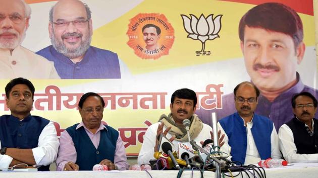 Delhi BJP chief Manoj Tiwari and other party workers at a press conference on Friday.(Handout)