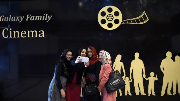Afghan women take a selfie after watching a Hollywood movie at the Galaxy Family Cinema in Kabul. (AFP) Afghan women take a selfie after watching a Hollywood movie at the Galaxy Family Cinema in Kabul. (AFP)