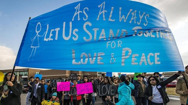 Hundreds of people march for peace on Sunday, Feb. 26, 2017, in Olathe, Kan., before starting a prayer vigil in response to the deadly shooting of two Indian immigrants--Srinivas Kuchibothla and Alok Madasani- and a third man, Ian Grillot, at a bar. (AP File) Hundreds of people march for peace on Sunday, Feb. 26, 2017, in Olathe, Kan., before starting a prayer vigil in response to the deadly shooting of two Indian immigrants--Srinivas Kuchibothla and Alok Madasani- and a third man, Ian Grillot, at a bar. (AP File)