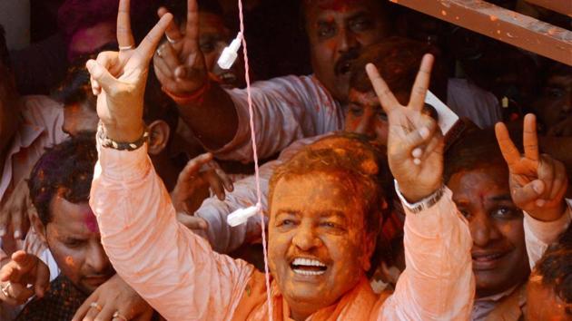 UP BJP President Keshav Prasad Maurya flashes victory sign as he celebrates the party’s victory in the assembly elections. (PTI) UP BJP President Keshav Prasad Maurya flashes victory sign as he celebrates the party’s victory in the assembly elections. (PTI)