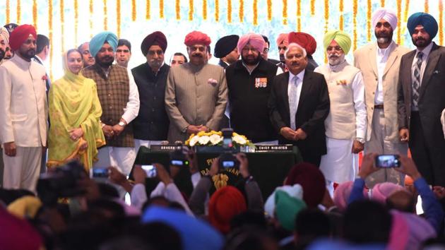 Punjab governor VP Singh Badnore, CM Capt Amarinder Singh with newly inducted ministers (from left) Charanjit Singh Channi, Aruna Chaudhary, Sadhu Singh Dharamsot, Tript Rajinder Singh Bajwa, Brahm Mohindra, Rana Gurjit Singh, Manpreet Singh Badal, Navjot Singh Sidhu and Razia Sultana after the swearingin at Punjab Raj Bhawan in Chandigarh on Thursday. (Sanjeev Sharma/HT) Punjab governor VP Singh Badnore, CM Capt Amarinder Singh with newly inducted ministers (from left) Charanjit Singh Channi, Aruna Chaudhary, Sadhu Singh Dharamsot, Tript Rajinder Singh Bajwa, Brahm Mohindra, Rana Gurjit Singh, Manpreet Singh Badal, Navjot Singh Sidhu and Razia Sultana after the swearingin at Punjab Raj Bhawan in Chandigarh on Thursday. (Sanjeev Sharma/HT)