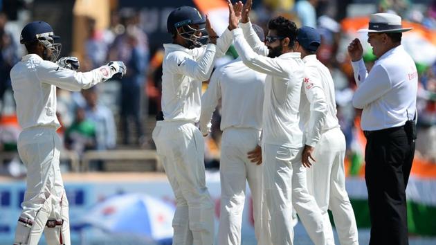 Ravindra Jadeja took 5/124 in the first innings of India vs Australia third Test in Ranchi. Australia were all out for 451. Get live cricket score of India vs Australia here.(AFP)