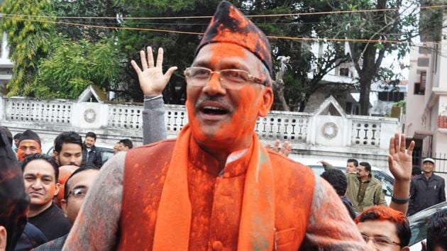 BJP workers hold up Trivendra Singh Rawat at the party office in Dehradun on March 11, 2017, after the assembly elections results were announced. (Vinay Santosh Kumar/HT File Photo) BJP workers hold up Trivendra Singh Rawat at the party office in Dehradun on March 11, 2017, after the assembly elections results were announced. (Vinay Santosh Kumar/HT File Photo)