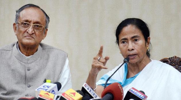 West Bengal chief minister Mamata Banerjee, seen with state finance minister Amit Mitra, addresses the media at her office Nabanna on Friday.(PTI)