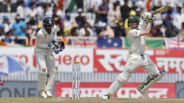 Australia's captain Steven Smith, right, plays a shot during the second day of their third Test match. (AP)