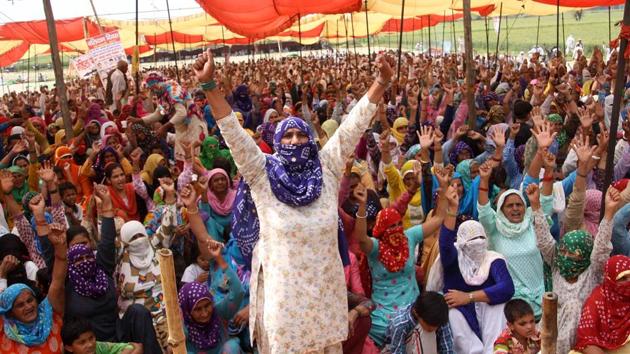 Protesters at the Jassia village in Rohtak district on Thursday. (Manoj Dhaka/HT) Protesters at the Jassia village in Rohtak district on Thursday. (Manoj Dhaka/HT)