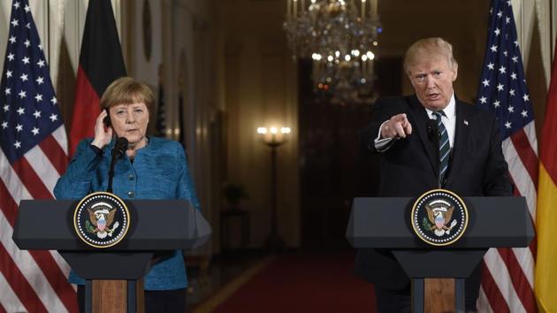 US President Donald Trump takes a question as he and German Chancellor Angela Merkel hold a joint press conference in the White House in Washington DC on Friday.(AFP) US President Donald Trump takes a question as he and German Chancellor Angela Merkel hold a joint press conference in the White House in Washington DC on Friday.(AFP)