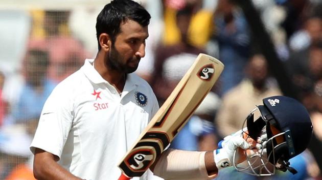 Cheteshwar Pujara of India celebrates after reaching his century against Australia in Ranchi. (BCCI) 