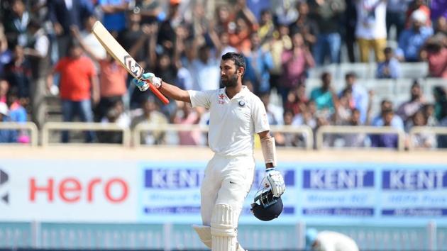 Cheteshwar Pujara slammed his 11th Test century and he became the first Indian batsman to score a century in the current series against Australia.(AFP)
