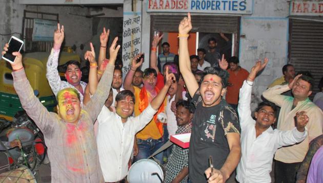 Members of Hindu Yuva Vahini in Raj Nagar Extension celebrate the selection of Yogi Adityanath as UP CM designate. (HT Photo) Members of Hindu Yuva Vahini in Raj Nagar Extension celebrate the selection of Yogi Adityanath as UP CM designate. (HT Photo)