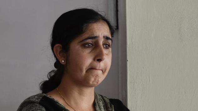 Harpreet Kaur, wife of Sarabjit Singh (not in picture) sentenced to life imprisonment in the 2012 Maruti Manesar plant violence case, at the district Court in Gurgaon on Saturday. (Sanjeev Verma/HT Photo) Harpreet Kaur, wife of Sarabjit Singh (not in picture) sentenced to life imprisonment in the 2012 Maruti Manesar plant violence case, at the district Court in Gurgaon on Saturday. (Sanjeev Verma/HT Photo)