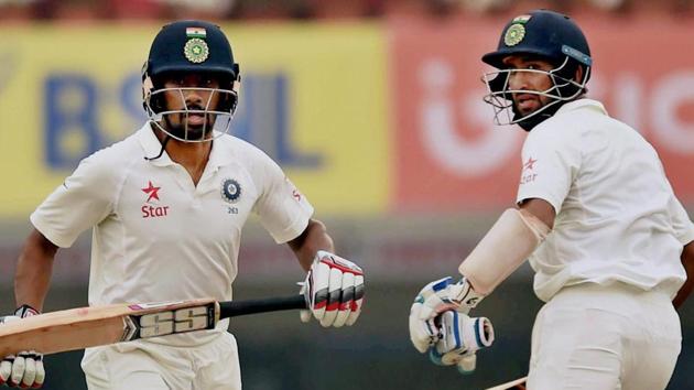 Wriddhiman Saha and Cheteshwar Pujara in action during India vs Australia Test in Ranchi. Catch Day 4 highlights of India vs Australia here.(PTI)
