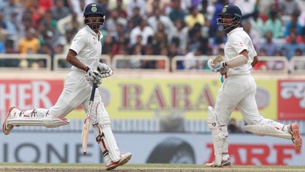Wriddhiman Saha and Cheteshwar Pujara in action during the third Test match in Ranchi. (BCCI)