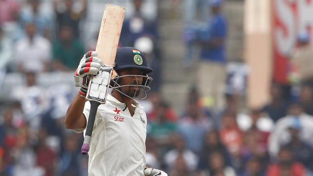 Wriddhiman Saha celebrates after scoring his century against Australia. (BCCI)