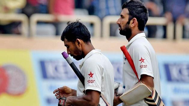 Wriddhiman Saha (L) and Cheteshwar Pujara set up a 199-run stand to help India wrest control of the third Test in Ranchi on Day 4.(PTI)