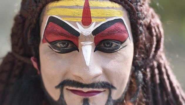 An artist dressed as lord Shiva during the Rashtriya Ekta Shivir (National Integration Camp) organized by Nehru Yuva Kendra Sangathan at Gandhi Smriti Darshan Samiti, Rajghat in New Delhi. (Raj K Raj/HT PHOTO)