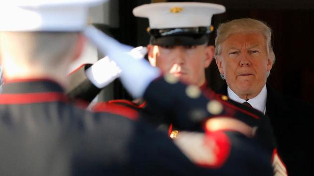 U.S. President Donald Trump waits with a U.S. Marine honor guard to welcome Ireland's Prime Minister Enda Kenny for a St. Patrick's Day reception at the White House in Washington, U.S. (Jonathan Ernst / REUTERS) U.S. President Donald Trump waits with a U.S. Marine honor guard to welcome Ireland's Prime Minister Enda Kenny for a St. Patrick's Day reception at the White House in Washington, U.S. (Jonathan Ernst / REUTERS)