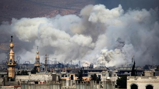 Smoke billows following reported air strikes by Syrian government forces on Damascus' north eastern rebel-held al-Qaboun surburb. (AMER ALMOHIBANY / AFP) Smoke billows following reported air strikes by Syrian government forces on Damascus' north eastern rebel-held al-Qaboun surburb. (AMER ALMOHIBANY / AFP)