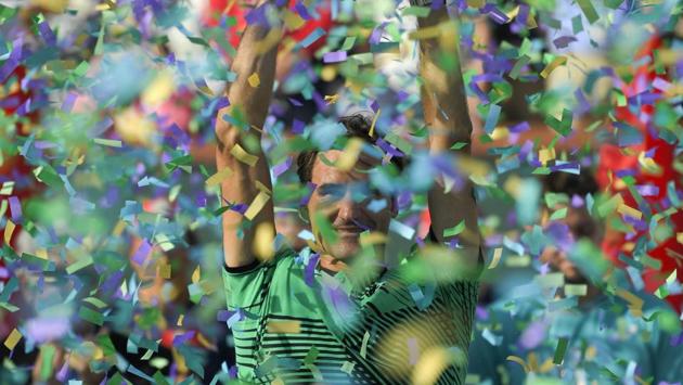 Roger Federer celebrates his win against Stanislas Wawrinka in the final of the BNP Paribas Open tennis tournament in Indian Wells, Calif on Sunday. (AP) Roger Federer celebrates his win against Stanislas Wawrinka in the final of the BNP Paribas Open tennis tournament in Indian Wells, Calif on Sunday. (AP)