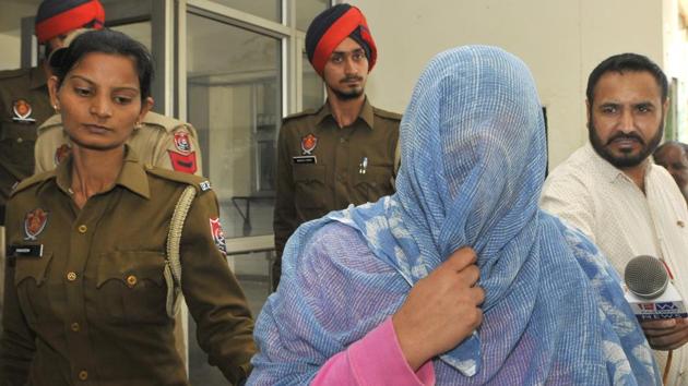 Seerat Kaur in police custody in SAS Nagar on Monday.(Keshav Singh/HT Photo)