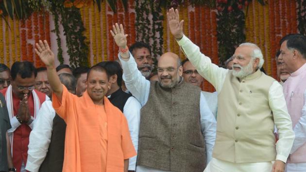 Yogi Adityanath (left), BJP chief Amit Shah (centre) and Prime Minister Narendra Modi at Smriti Upvan in Lucknow on Sunday.(Ashok Dutta/HT Photo) Yogi Adityanath (left), BJP chief Amit Shah (centre) and Prime Minister Narendra Modi at Smriti Upvan in Lucknow on Sunday.(Ashok Dutta/HT Photo)