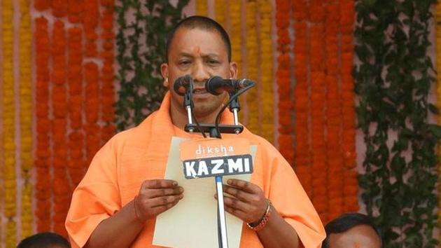 BJP leader Yogi Adityanath takes the oath as the new chief minister of Uttar Pradesh in Lucknow on Sunday. (Reuters Photo) BJP leader Yogi Adityanath takes the oath as the new chief minister of Uttar Pradesh in Lucknow on Sunday. (Reuters Photo)