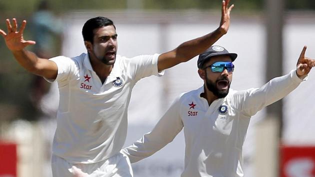 Ravichandran Ashwin, left, and captain Virat Kohli appeal for the wicket of Australia's Shaun Marsh during the first day of the third Test in Ranchi on March 16, 2017. Kohli has denied under-bowling Ashwin.(AP)