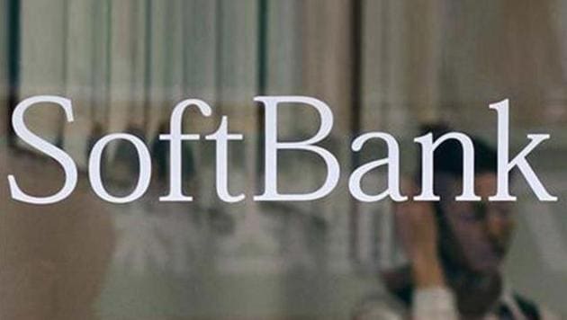 An employee works behind a logo of SoftBank Corp at its branch in Tokyo. (Reuters) An employee works behind a logo of SoftBank Corp at its branch in Tokyo. (Reuters)