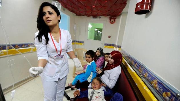 A nurse tends to Syrian boy Ghazi, who is suffering from cancer, at Damascus Children's Hospital in Damascus. Many drugs companies have erred on the side of caution, avoiding any business with Syria for fear of inadvertently falling foul of the sanctions. (Omar Sanadiki/REUTERS) A nurse tends to Syrian boy Ghazi, who is suffering from cancer, at Damascus Children's Hospital in Damascus. Many drugs companies have erred on the side of caution, avoiding any business with Syria for fear of inadvertently falling foul of the sanctions. (Omar Sanadiki/REUTERS)