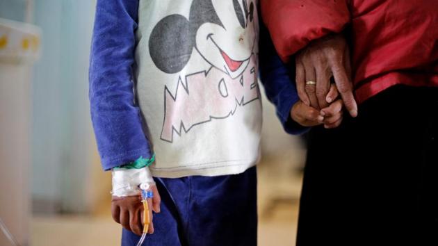 Syrian boy Ghazi (L) stands next to his mother Um Ghazi, as he receives treatment for cancer. (Omar Sanadiki/REUTERS) Syrian boy Ghazi (L) stands next to his mother Um Ghazi, as he receives treatment for cancer. (Omar Sanadiki/REUTERS)