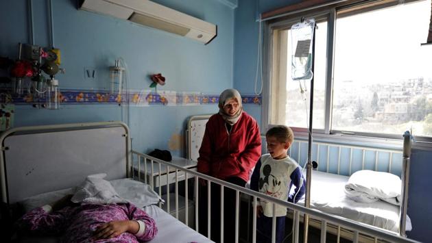Syrian boy Ghazi (R) who receives treatment for cancer and his mother Um Ghazi (C) stand at the bed of another patient. However, a lack of cash is not the only reason why supplies of cancer drugs are falling far short of increasing demand. (Omar Sanadiki/REUTERS) Syrian boy Ghazi (R) who receives treatment for cancer and his mother Um Ghazi (C) stand at the bed of another patient. However, a lack of cash is not the only reason why supplies of cancer drugs are falling far short of increasing demand. (Omar Sanadiki/REUTERS)