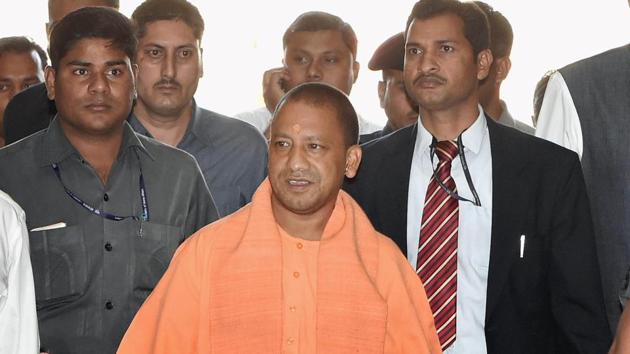 Uttar Pradesh chief minister Yogi Adityanath arrives for a meeting with police officers in Lucknow on Monday.(PTI photo)