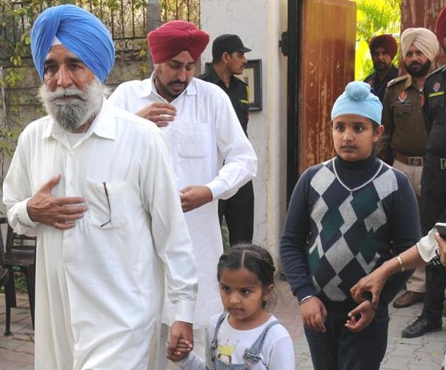 The deceased’s father Jaspal Singh Dhillon and brother Darshan Singh Dhillon with his children after meeting the Punjab CM in Chandigarh on Monday.(Anil Dayal/HT Photo)