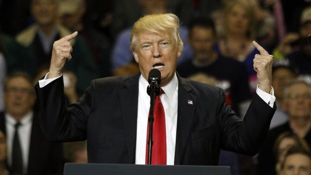US President Donald Trump holds a rally in Freedom Hall at the Kentucky Exposition Centre on March 20 in Louisville, Kentucky. (AFP) US President Donald Trump holds a rally in Freedom Hall at the Kentucky Exposition Centre on March 20 in Louisville, Kentucky. (AFP)