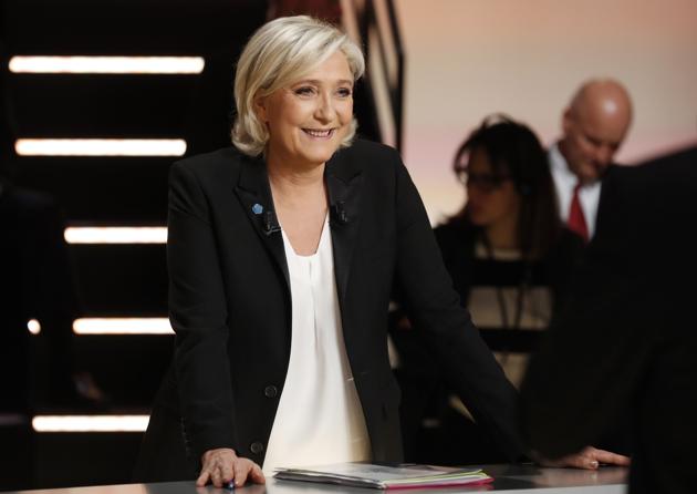 Marine Le Pen prior to a television debate at French TV station TF1 in Aubervilliers, near Paris. (AP) Marine Le Pen prior to a television debate at French TV station TF1 in Aubervilliers, near Paris. (AP)