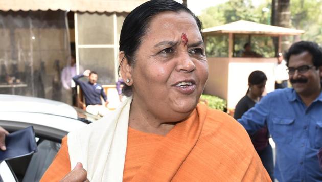 Union minister Uma Bharti argues that if a minister fails to attend a meeting, a decision regarding a project might be delayed and cost the state exchequer crores of rupees(HT file photo)