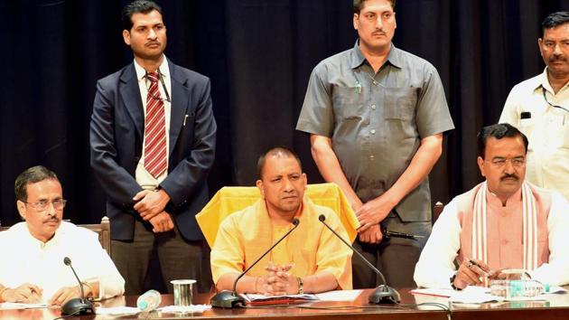 UP chief minister Yogi Adityanath with deputy CMs Dinesh Sharma and Keshav Prasad Muriya at a meeting of police officers in Lucknow on March 20, 2017. (PTI) UP chief minister Yogi Adityanath with deputy CMs Dinesh Sharma and Keshav Prasad Muriya at a meeting of police officers in Lucknow on March 20, 2017. (PTI)